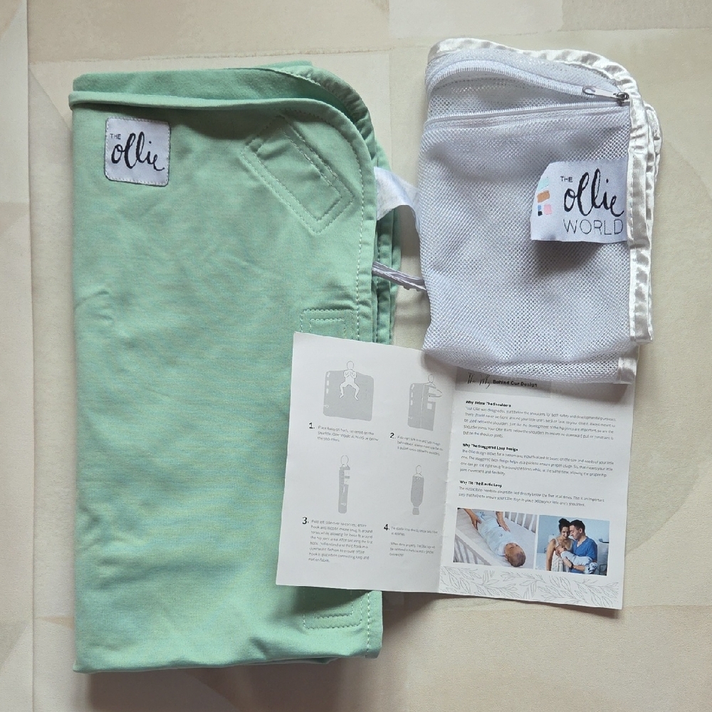 The Ollie World Swaddle in Green